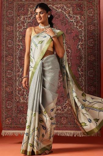 Off white printed art silk ethnic saree with blouse piece