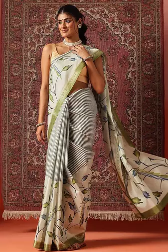 Off white printed art silk ethnic saree with blouse piece