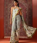 Off white printed art silk ethnic saree with blouse piece