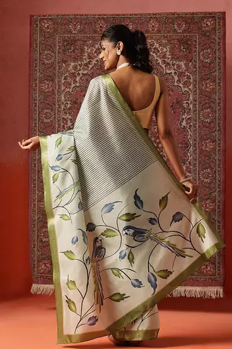 Off white printed art silk ethnic saree with blouse piece