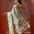 Off white printed art silk ethnic saree with blouse piece