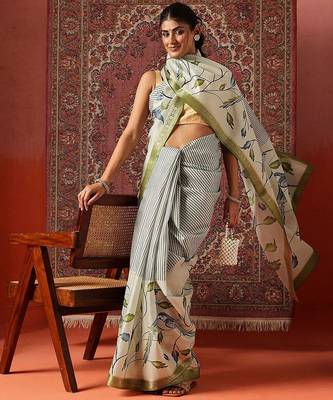 Off white printed art silk ethnic saree with blouse piece 3