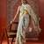 Off white printed art silk ethnic saree with blouse piece