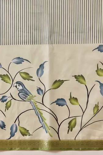 Off white printed art silk ethnic saree with blouse piece