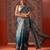 Teal printed art silk ethnic saree with blouse piece