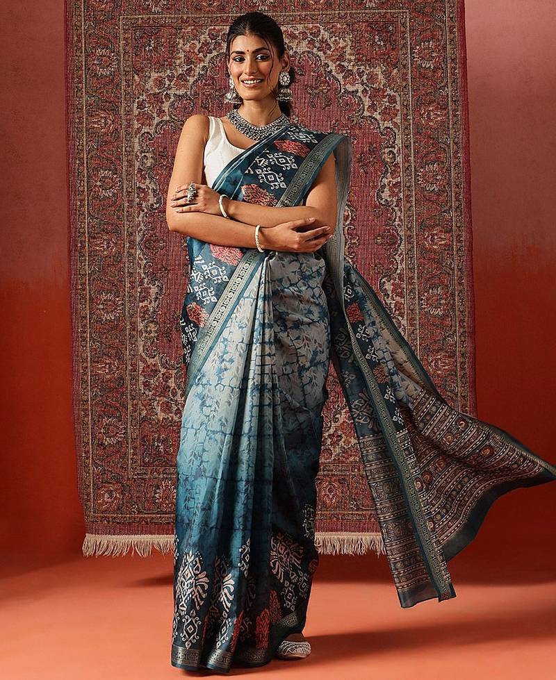 Teal printed art silk ethnic saree with blouse piece