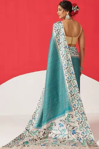 Teal woven silk blend ethnic saree with blouse piece