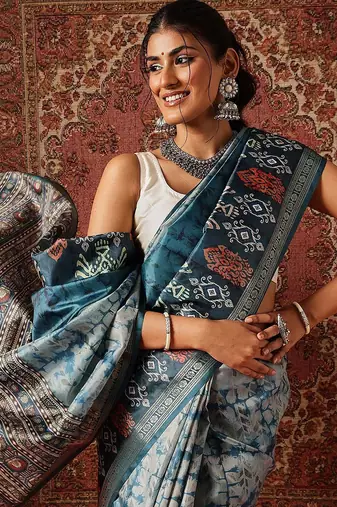 Teal printed art silk ethnic saree with blouse piece