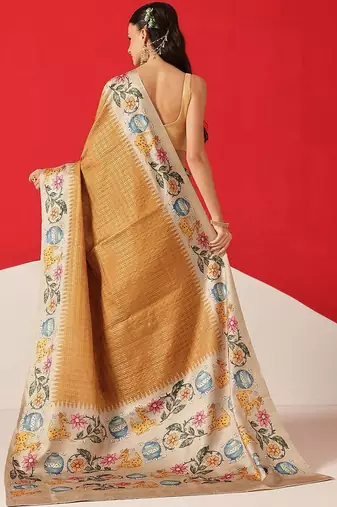 Golden woven silk blend ethnic saree with blouse piece