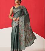 Teal woven silk blend ethnic saree with blouse piece