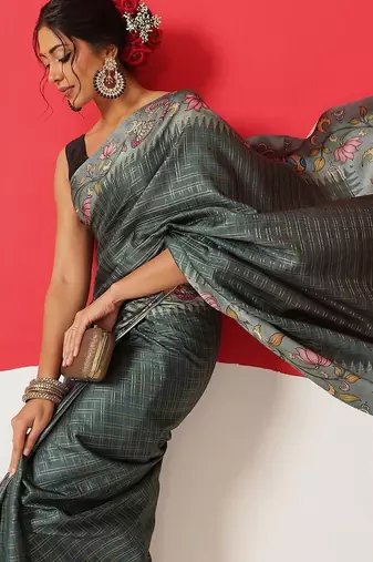 Teal woven silk blend ethnic saree with blouse piece