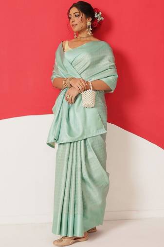 Sea green woven silk blend ethnic saree with blouse piece