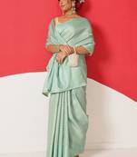 Sea green woven silk blend ethnic saree with blouse piece