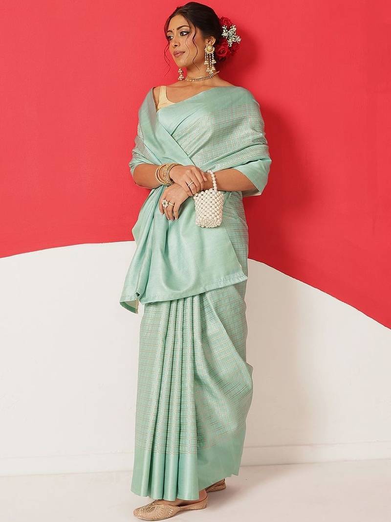 Sea green woven silk blend ethnic saree with blouse piece