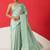 Sea green woven silk blend ethnic saree with blouse piece