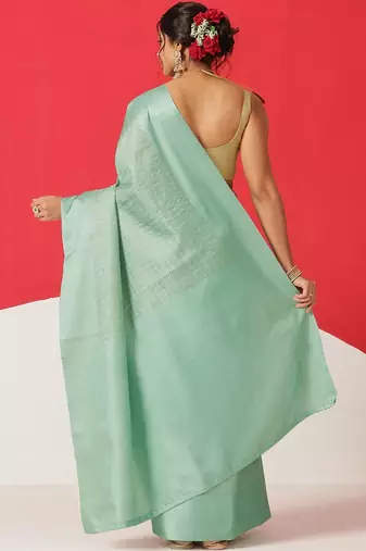 Sea green woven silk blend ethnic saree with blouse piece