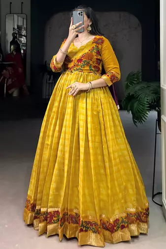 Rich Mustard Yellow Zari Weaving Chanderi Haldi Wear Gown With Koti
