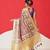 Beige printed tissue traditional saree with blouse piece