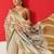 Off white printed tissue traditional saree with blouse piece