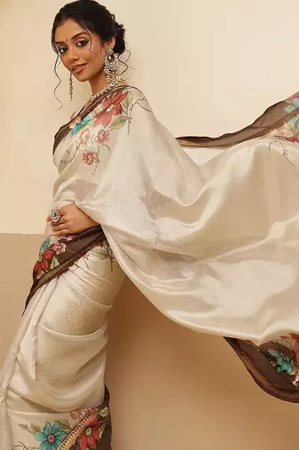 Off white printed silk blend ethnic saree with blouse piece