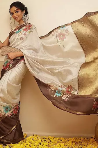 Off white printed silk blend ethnic saree with blouse piece