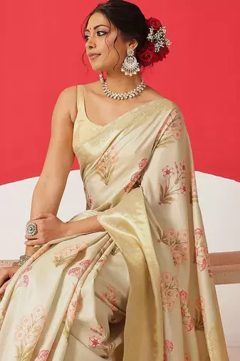Cream printed tissue traditional saree with blouse piece