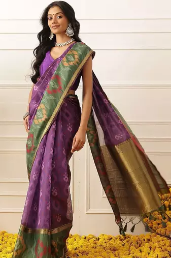 Purple woven silk blend ethnic saree with blouse piece