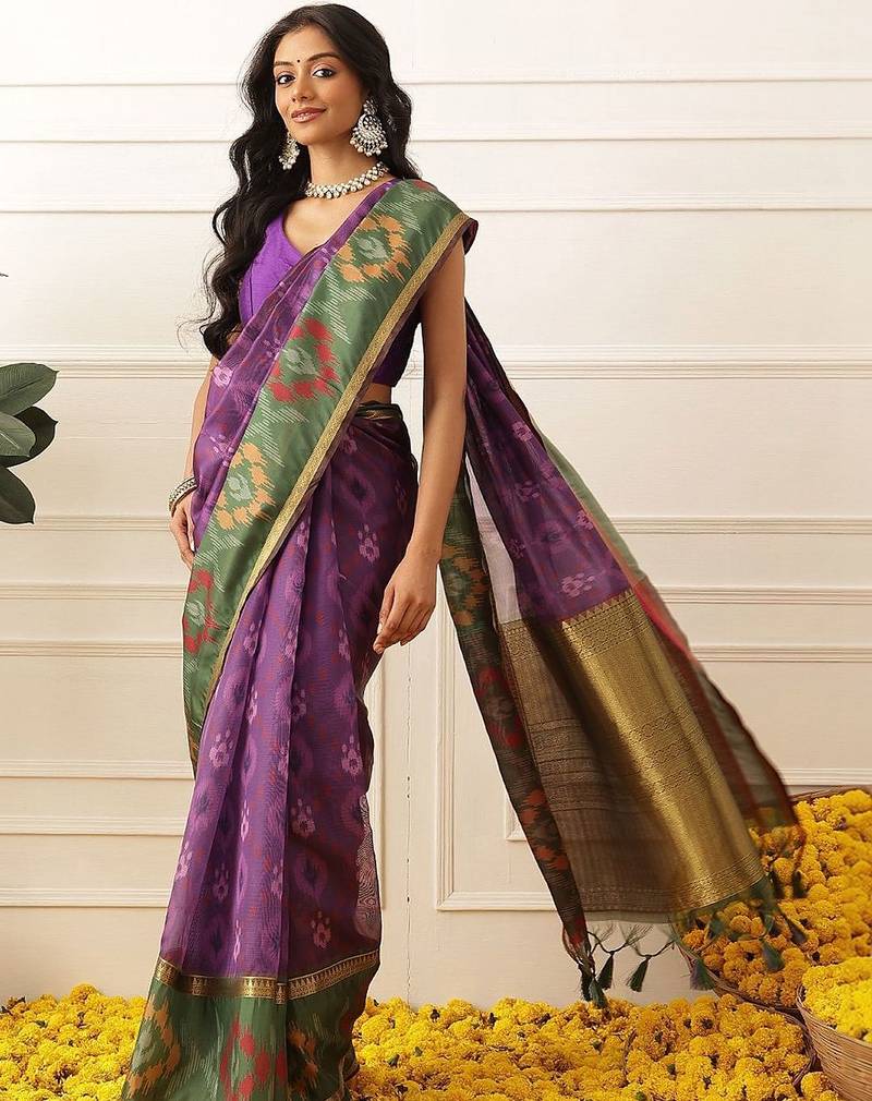 Purple woven silk blend ethnic saree with blouse piece