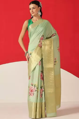 Sea green printed tissue traditional saree with blouse piece