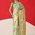 Sea green printed tissue traditional saree with blouse piece