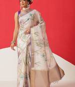 Off white printed tissue traditional saree with blouse piece