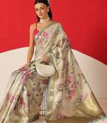 Cream printed tissue traditional saree with blouse piece