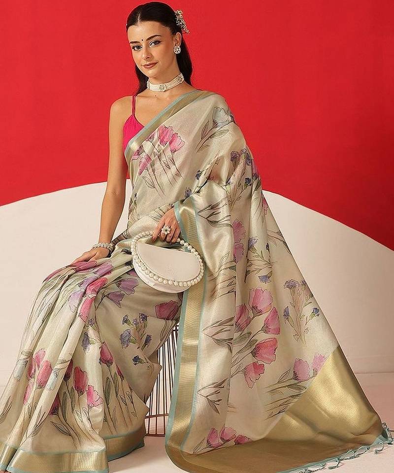 Cream printed tissue traditional saree with blouse piece