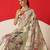 Cream printed tissue traditional saree with blouse piece