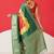 Green printed art silk ethnic saree with blouse piece