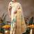 Cream printed tissue traditional saree with blouse piece