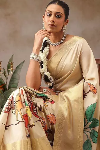Cream printed tissue traditional saree with blouse piece