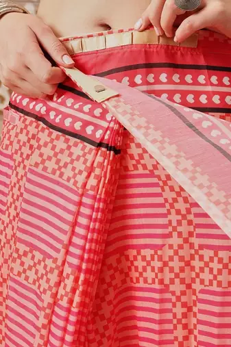 Red printed cotton blend ethnic saree with blouse piece