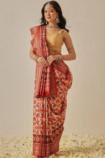 Cream woven art silk traditional saree with blouse piece
