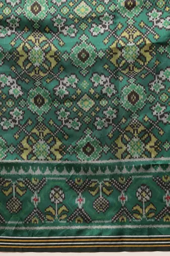 Green woven art silk traditional saree with blouse piece