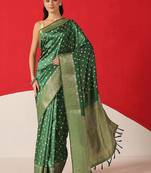 Green woven art silk traditional saree with blouse piece