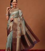 Sea green printed art silk ethnic saree with blouse piece