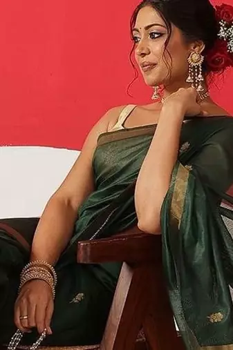 Green woven cotton blend traditional saree with blouse piece