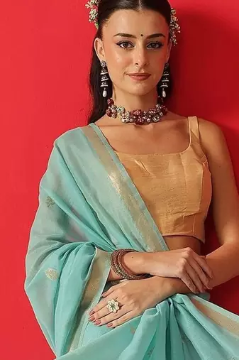 Turquoise embroidered cotton blend traditional saree with blouse piece