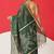Green woven cotton blend traditional saree with blouse piece