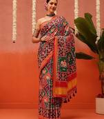 Red printed silk blend ethnic saree with blouse piece