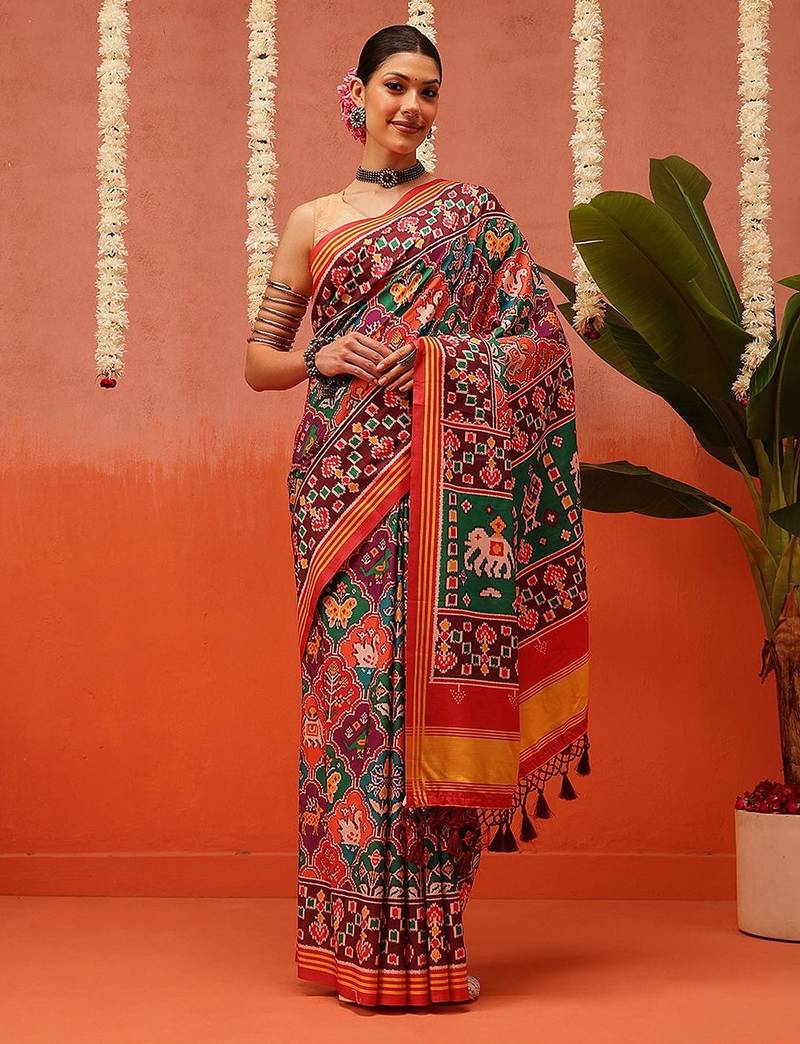 Red printed silk blend ethnic saree with blouse piece