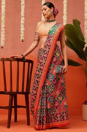 Red printed silk blend ethnic saree with blouse piece