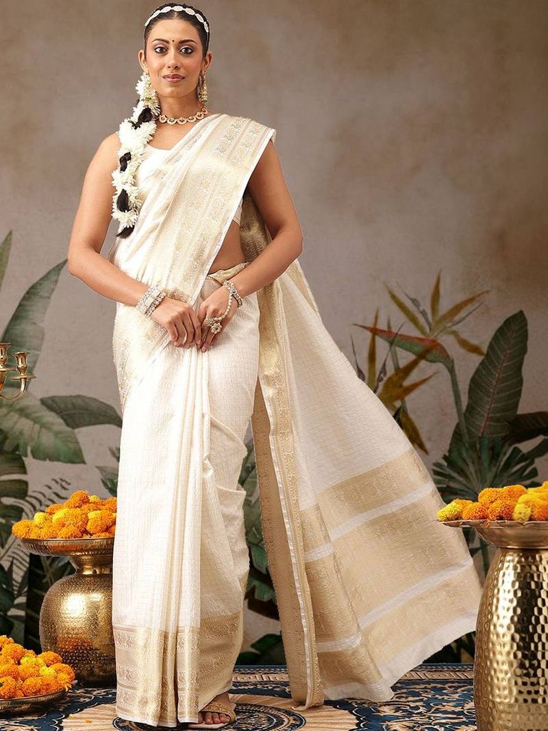 Off white woven silk blend ethnic saree with blouse piece