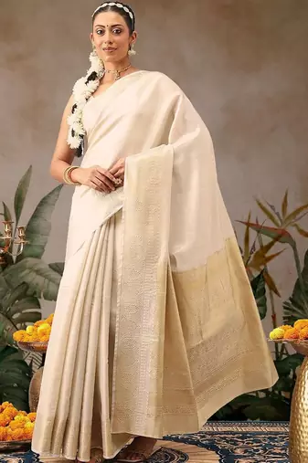 Off white woven silk blend ethnic saree with blouse piece